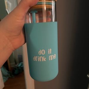 Glass tumblr with straw